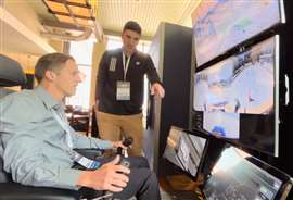 A ConTech delegate tries the Caterpillar's Cat Command Station. (Image: Mitchell Keller)