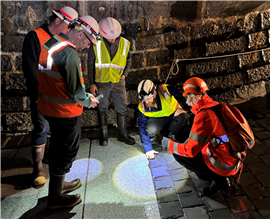 USACE in Swiss dam tunnel (Image: Carly Lynch, USACE – Alaska District)