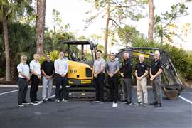 L to R: Agako Nouch, Kent Somerville, Trayson Mathias and Scott Young of Volvo CE with Aaron Birnbaum, Will Bailie, Mark Humprey, Rob Valerio and Matt Gavin of Herc Rentals in Bonita Springs, Fla., in front of a recently delivered EC37 compact excavator.